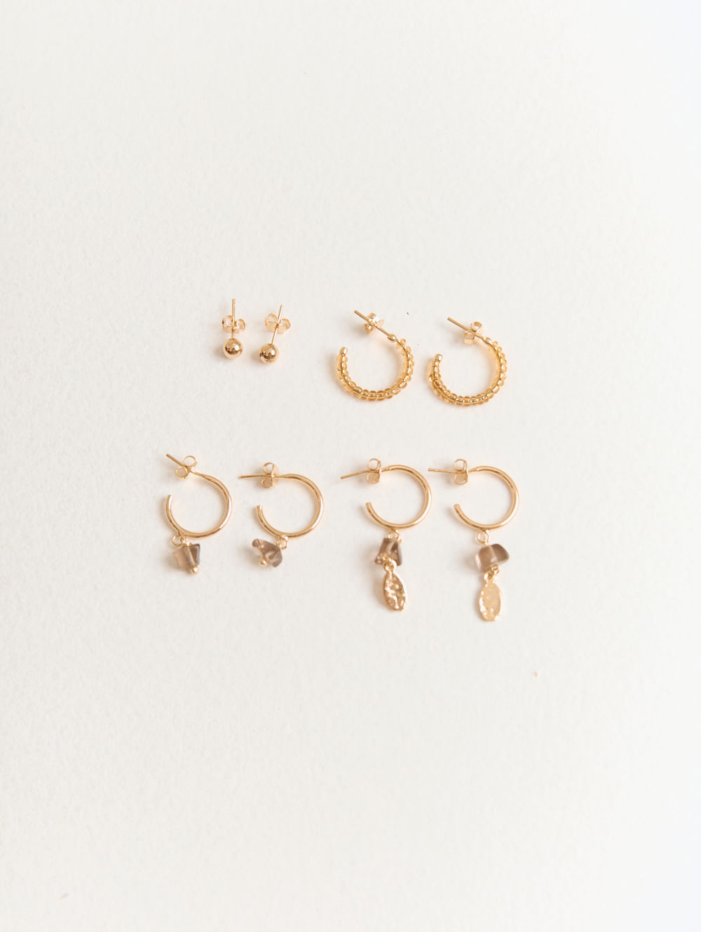 Kit 04 pares de brincos metal variados dourado